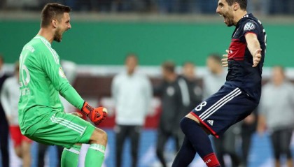 莱比锡RB客场逼平拜仁终结不败  